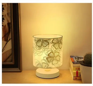 Wooden USB table LED lamp in white finish with dimmer switch, 14x14x33 cm, on a bedside table