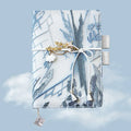 Glacier embroidery design fabric notebook in A6 and A5 sizes with grid pages.