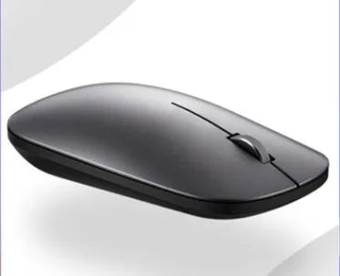 Huawei HWAF30 silver gray wireless Bluetooth optical mouse on a desk
