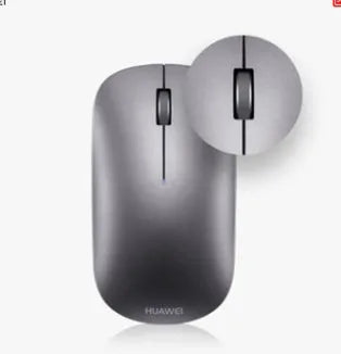 Huawei HWAF30 silver gray wireless Bluetooth optical mouse on a desk
