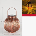 Outdoor waterproof hollow landscape LED lamp in a garden courtyard setting with decorative light pattern