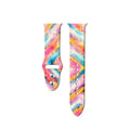 Colourful tie-dye and leopard print silicone Apple Watch strap shown in standard and long lengths.