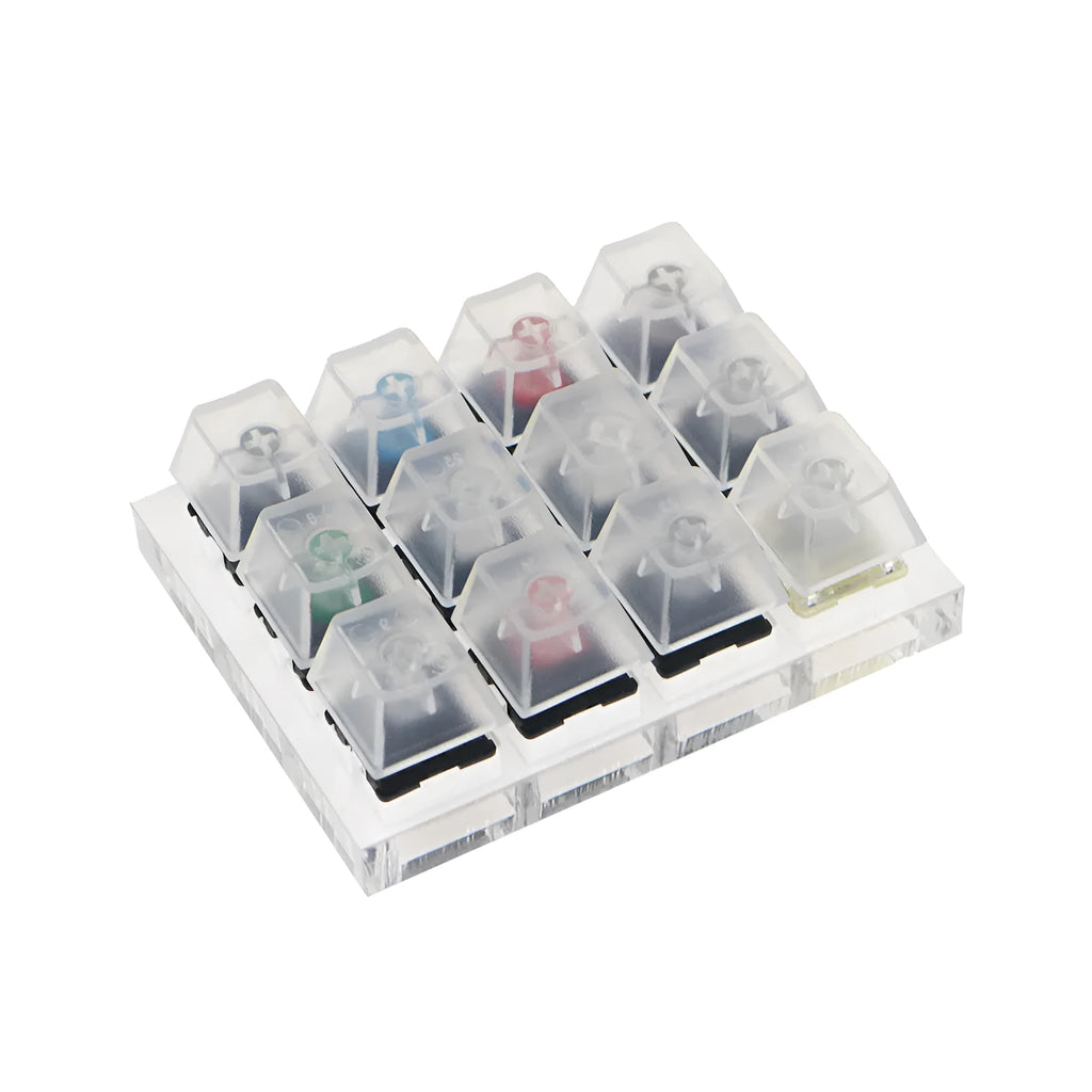 White Cherry MX mechanical keyboard switch tester with twelve keys featuring Black, Green, Black Tea and Milk Green switches