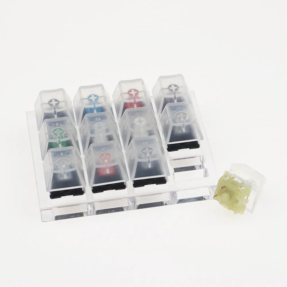 White Cherry MX mechanical keyboard switch tester with twelve keys featuring Black, Green, Black Tea and Milk Green switches