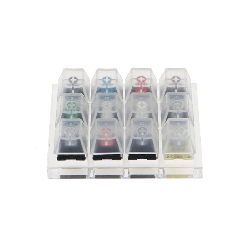 White Cherry MX mechanical keyboard switch tester with twelve keys featuring Black, Green, Black Tea and Milk Green switches
