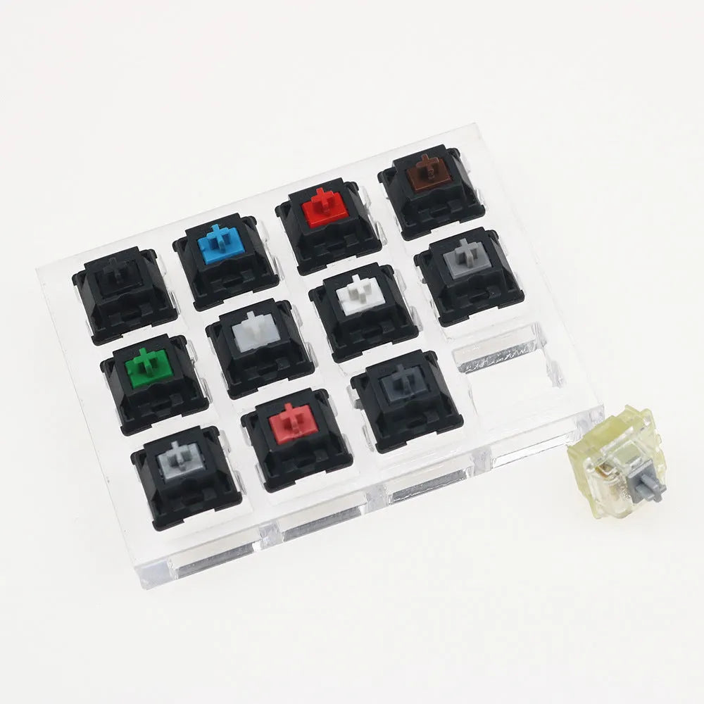 White Cherry MX mechanical keyboard switch tester with twelve keys featuring Black, Green, Black Tea and Milk Green switches