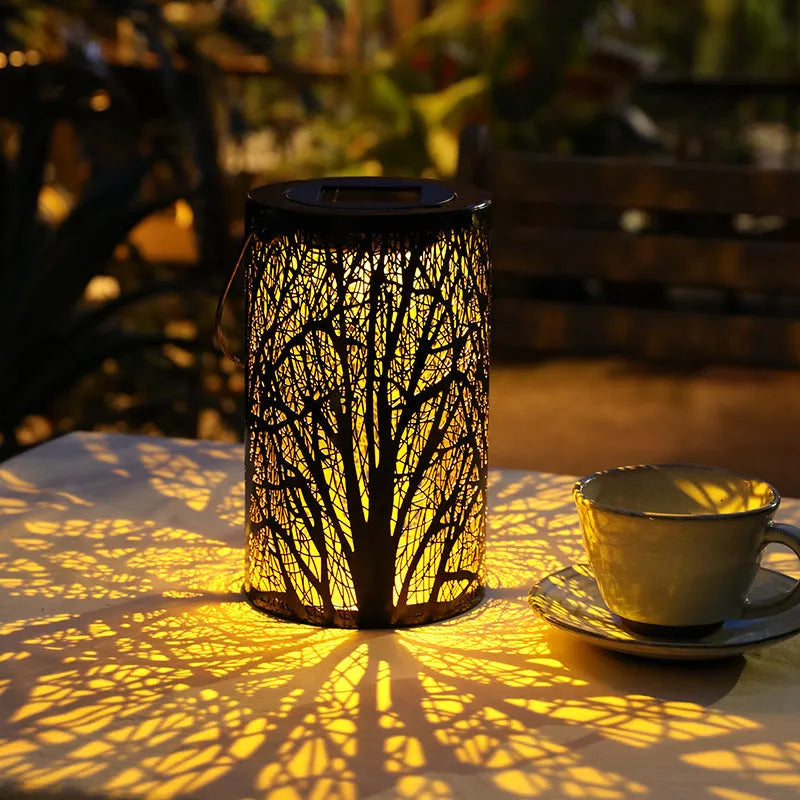 Outdoor waterproof hollow landscape LED lamp in a garden courtyard setting with decorative light pattern