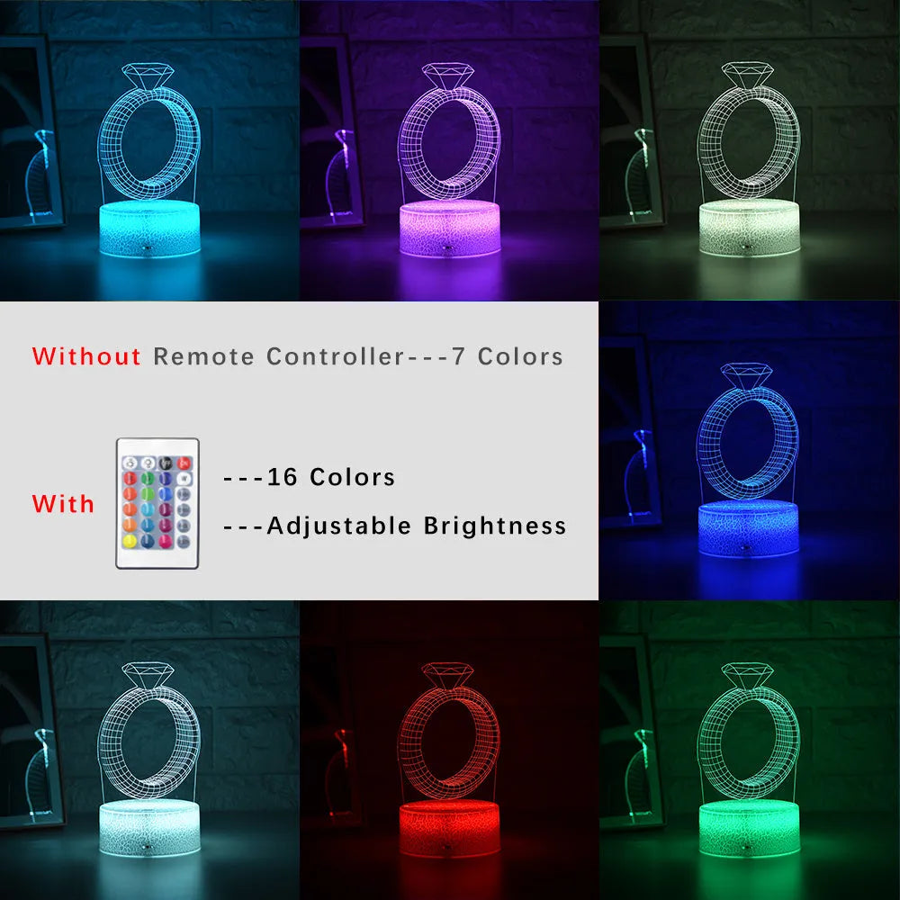 3D LED night light projecting a glowing diamond ring design on a black base with colour-changing effects.