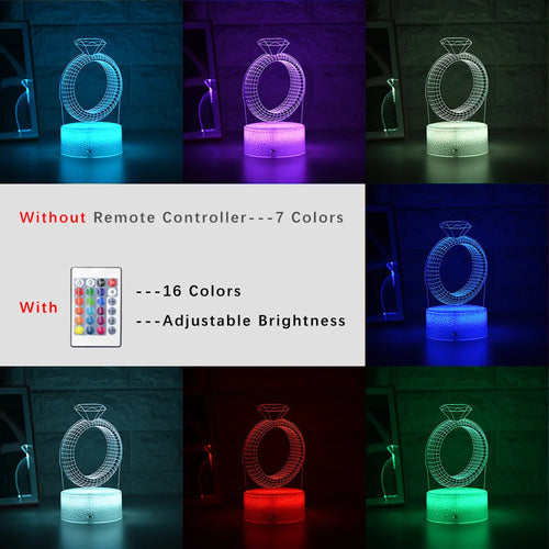 3D LED night light projecting a glowing diamond ring design on a black base with colour-changing effects.