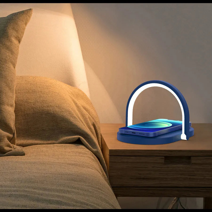 Black wireless charging stand with night light and phone holder showing 15W fast charging capability