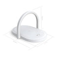 Black wireless charging stand with night light and phone holder showing 15W fast charging capability