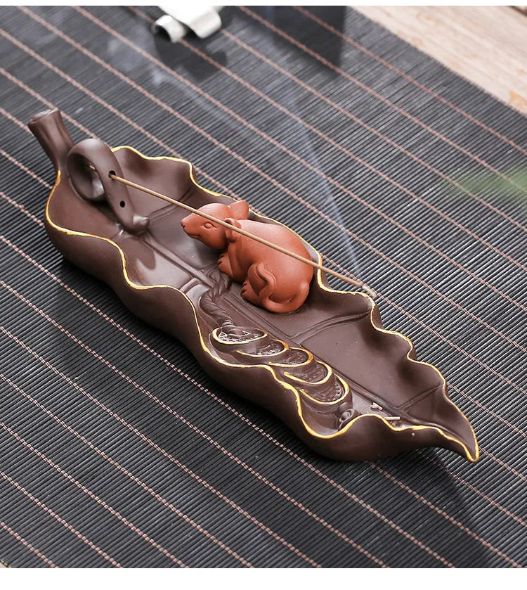 Purple clay ceramic lying incense burner with golden rat design for horizontal incense sticks