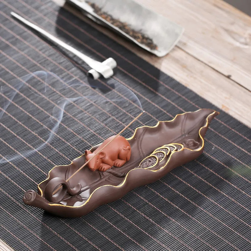Purple clay ceramic lying incense burner with golden rat design for horizontal incense sticks