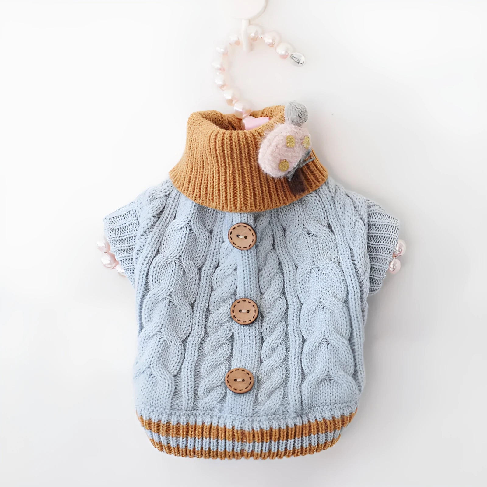 Classic knitted pet sweater for small dogs in twist-button blue colour