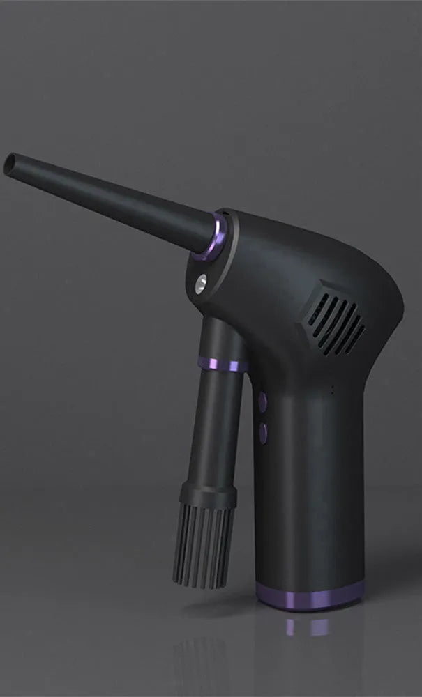 Black cordless air duster with full-palm grip and withdrawable nozzle for computer and camera cleaning