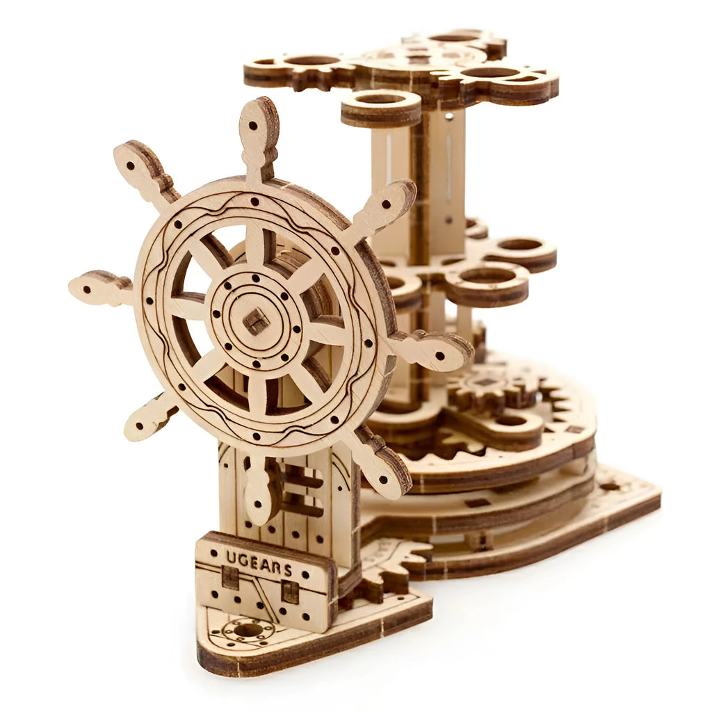 Assembled wooden desk pen holder with a steering wheel that rotates a central platform holding coloured pens.