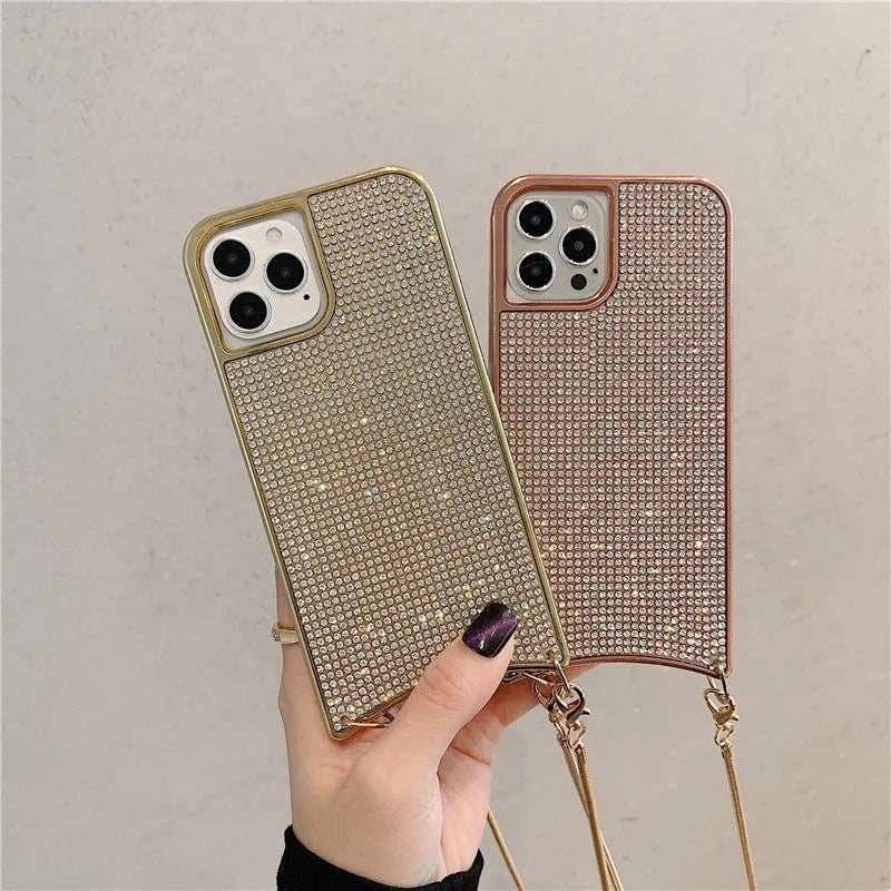 Go Boy sparkle glitter rhinestone TPU phone case with lanyard strap and chain for Apple iPhone, shown in Gold finish on iPhone 12