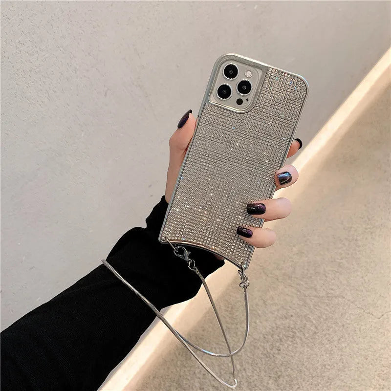 Go Boy sparkle glitter rhinestone TPU phone case with lanyard strap and chain for Apple iPhone, shown in Gold finish on iPhone 12