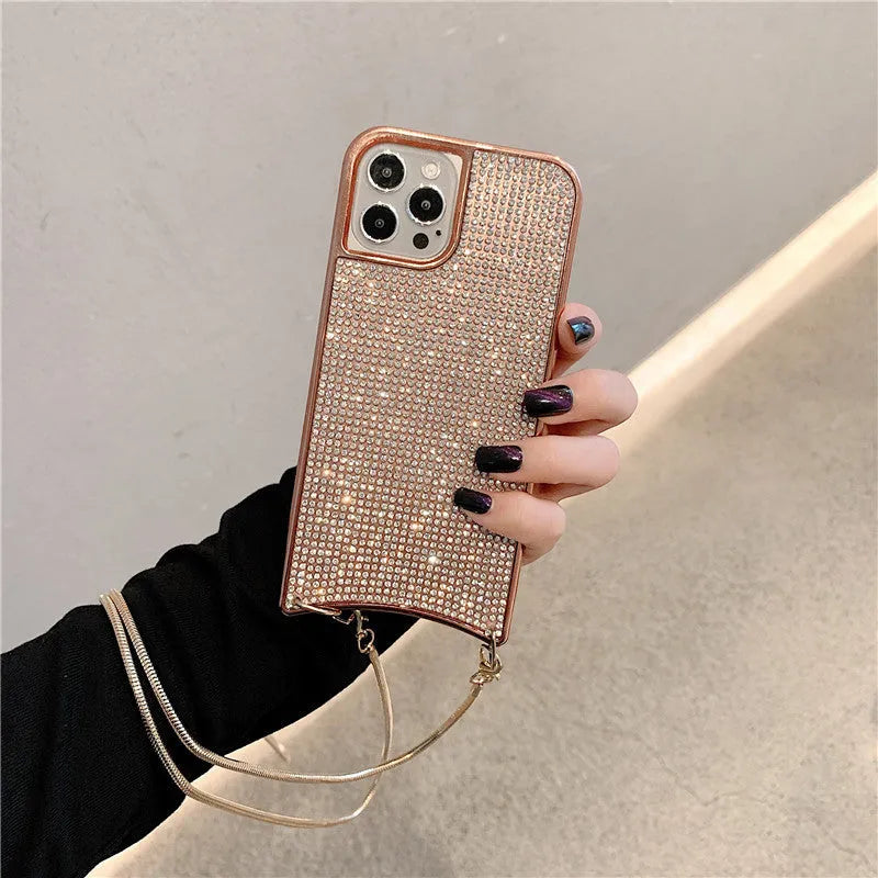 Go Boy sparkle glitter rhinestone TPU phone case with lanyard strap and chain for Apple iPhone, shown in Gold finish on iPhone 12