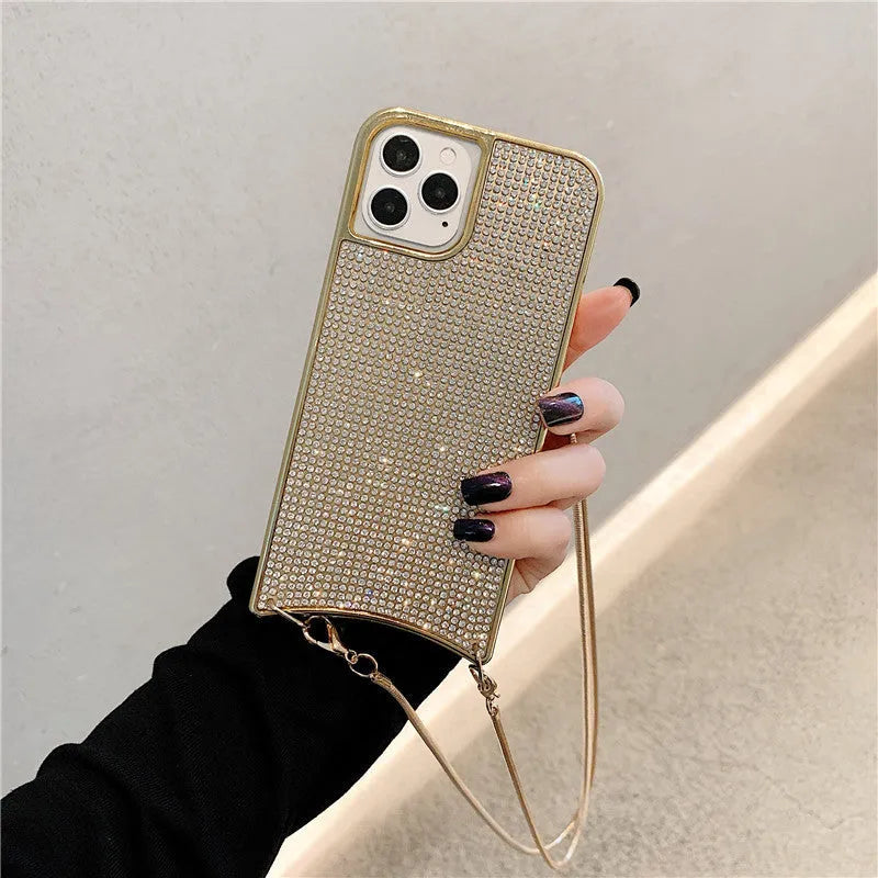 Go Boy sparkle glitter rhinestone TPU phone case with lanyard strap and chain for Apple iPhone, shown in Gold finish on iPhone 12
