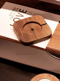Walnut solid wood magnetic wireless charger bracket with round section design on desk