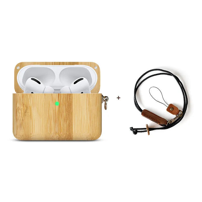 Solid wood earphone sleeve in walnut next to compatible wireless earphones on a wooden table.