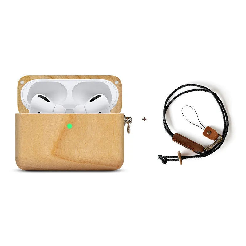 Solid wood earphone sleeve in walnut next to compatible wireless earphones on a wooden table.