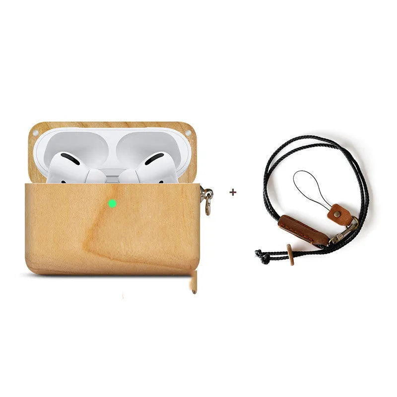 Solid wood earphone sleeve in walnut next to compatible wireless earphones on a wooden table.