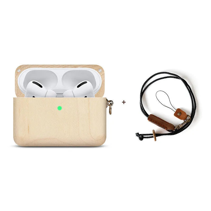 Solid wood earphone sleeve in walnut next to compatible wireless earphones on a wooden table.