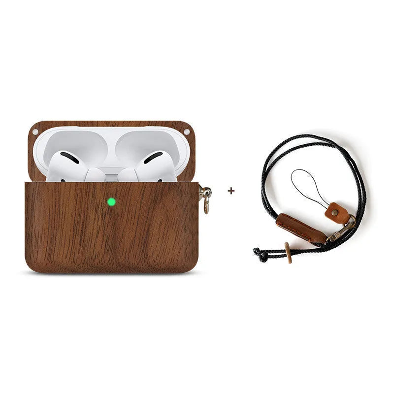 Solid wood earphone sleeve in walnut next to compatible wireless earphones on a wooden table.