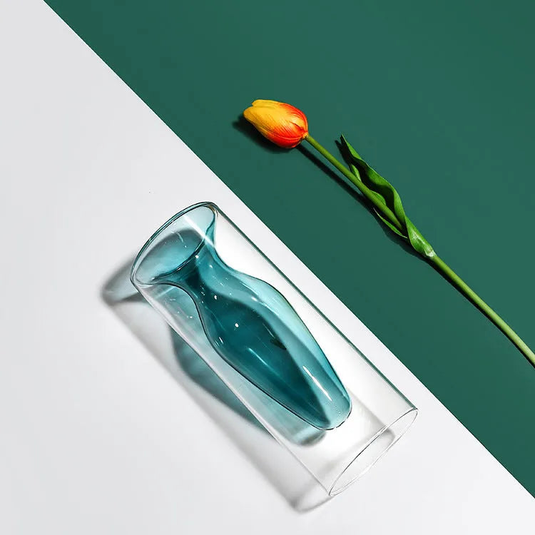 Small colourful double layer blown glass vase for dried flowers, yellow colour option on a table