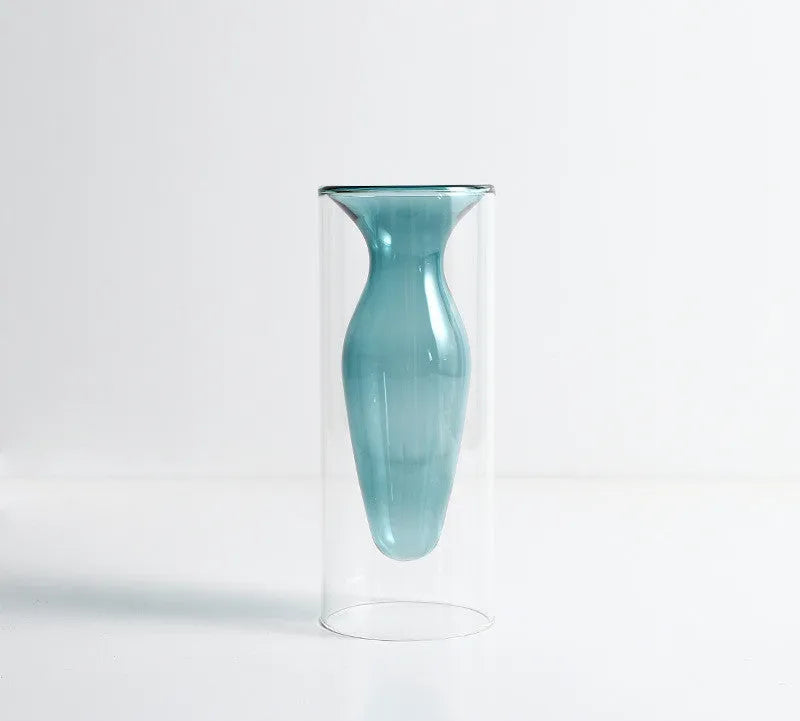 Small colourful double layer blown glass vase for dried flowers, yellow colour option on a table