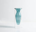Small colourful double layer blown glass vase for dried flowers, yellow colour option on a table