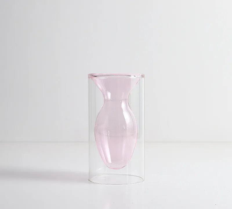 Small colourful double layer blown glass vase for dried flowers, yellow colour option on a table
