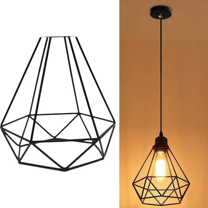 Black iron adjustable chandelier pendant light with retractable cord over a living room table.