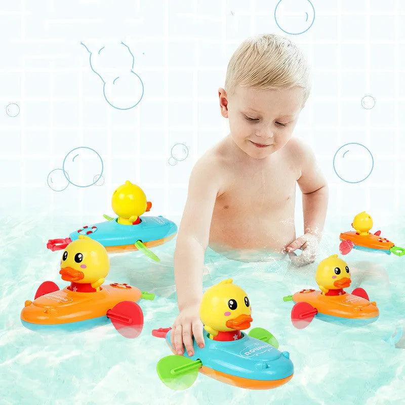Yellow plastic wind-up swimming duck bath toy for children's water play