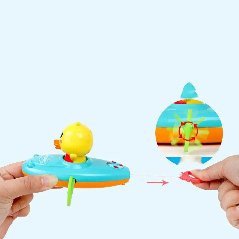Yellow plastic wind-up swimming duck bath toy for children's water play