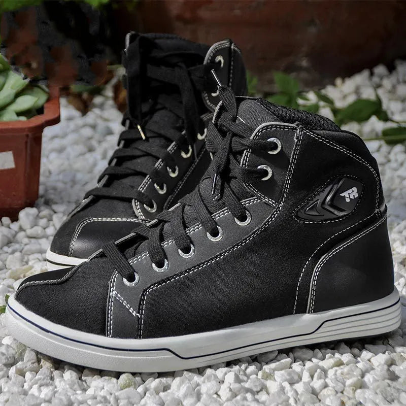 Tiger Boots black and grey casual short motorcycle boots on a white background, showing breathable mesh panels and anti-slip sole tread.
