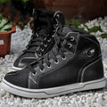 Tiger Boots black and grey casual short motorcycle boots on a white background, showing breathable mesh panels and anti-slip sole tread.