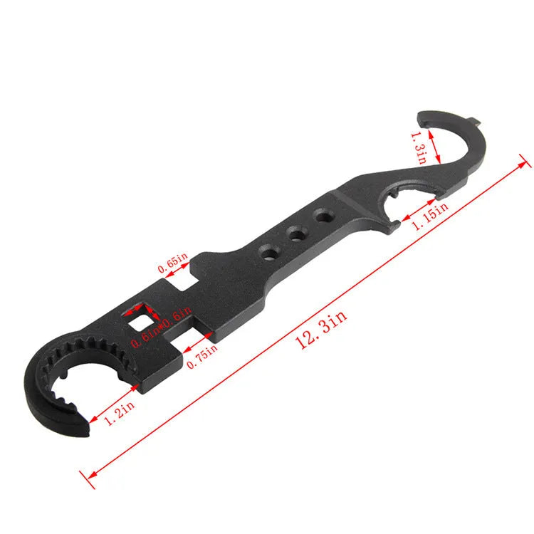 Black multi-function combination wrench for AR-15 and M4 rifles on a plain background.