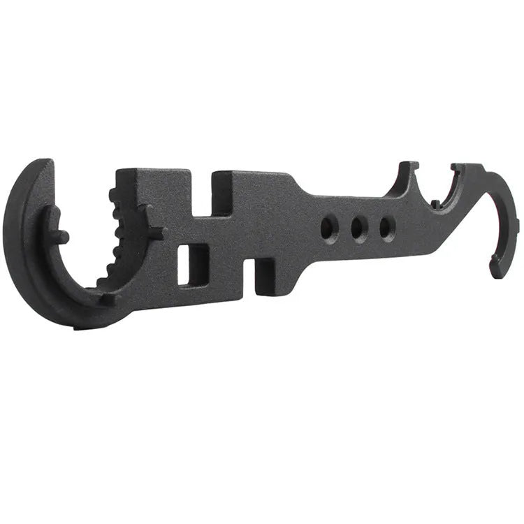 Black multi-function combination wrench for AR-15 and M4 rifles on a plain background.