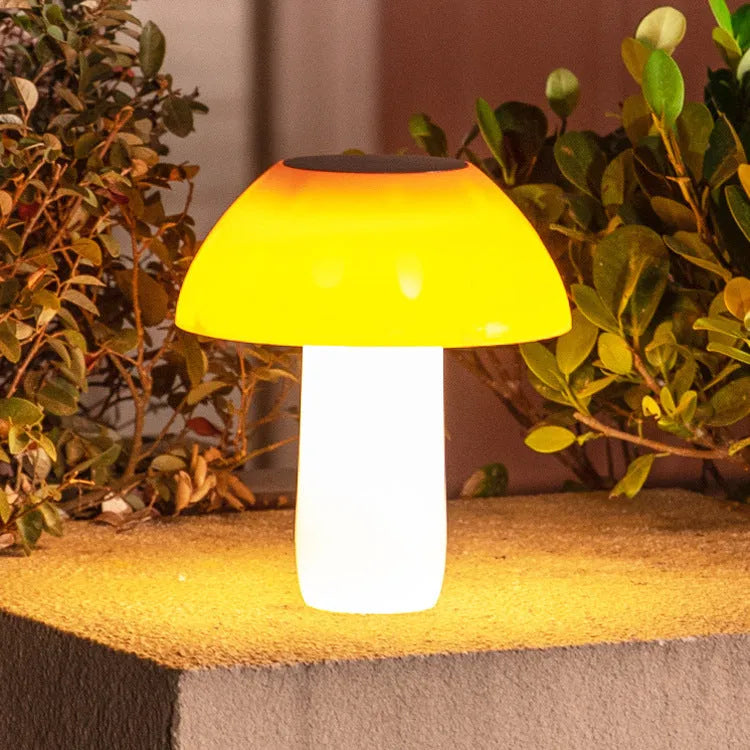 Solar-powered mushroom-shaped ground plug light for garden and lawn decoration.