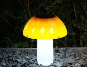 Solar-powered mushroom-shaped ground plug light for garden and lawn decoration.