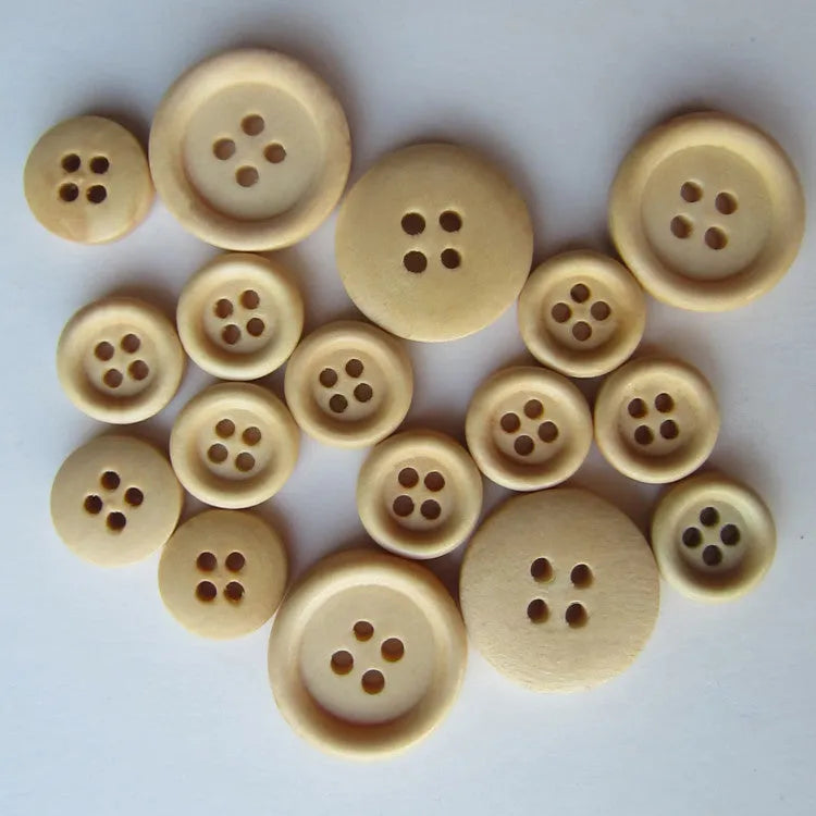 Round natural wood Bakelite button with concave flower design in photo colour