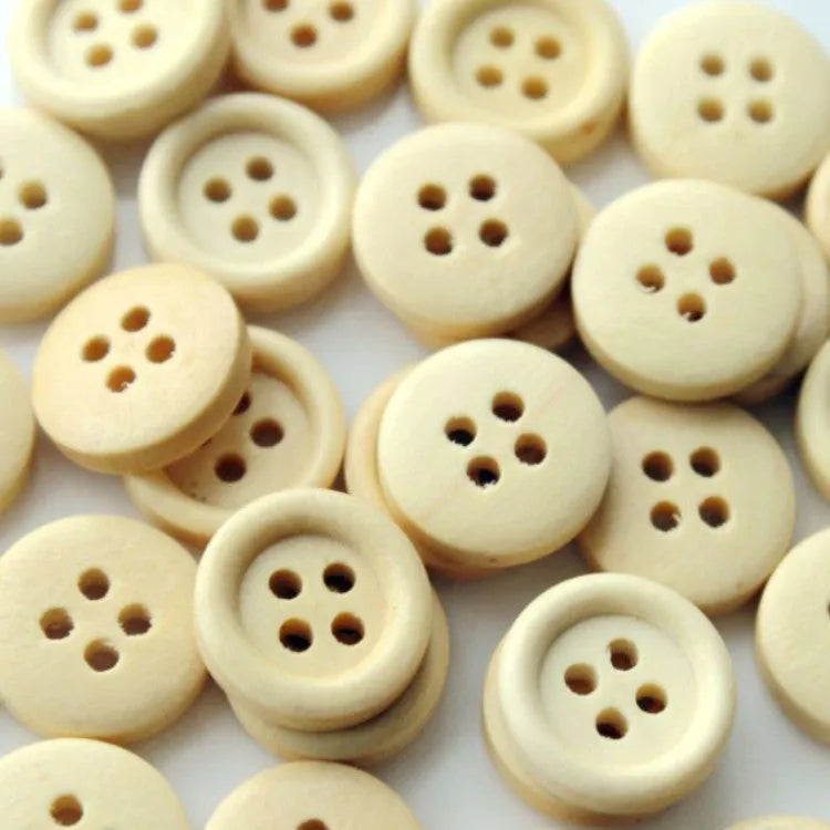 Round natural wood Bakelite button with concave flower design in photo colour