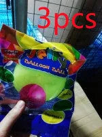 Assortment of inflated pink, yellow, blue and green TPR bouncy balls in different sizes on a plain background.