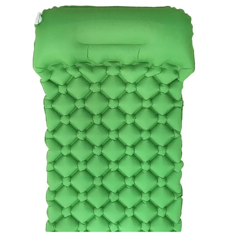 TPU outdoor inflatable cushion in blue, inflated on grass, 190x56x5.5cm, waterproof camping mat