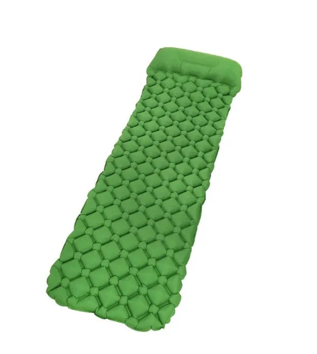 TPU outdoor inflatable cushion in blue, inflated on grass, 190x56x5.5cm, waterproof camping mat