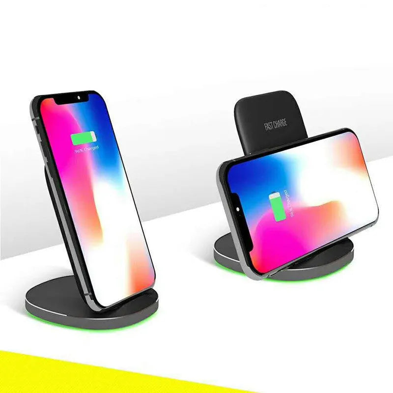 Vertical wireless charging dock in black colour charging smartphone upright on desk