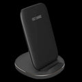 Vertical wireless charging dock in black colour charging smartphone upright on desk